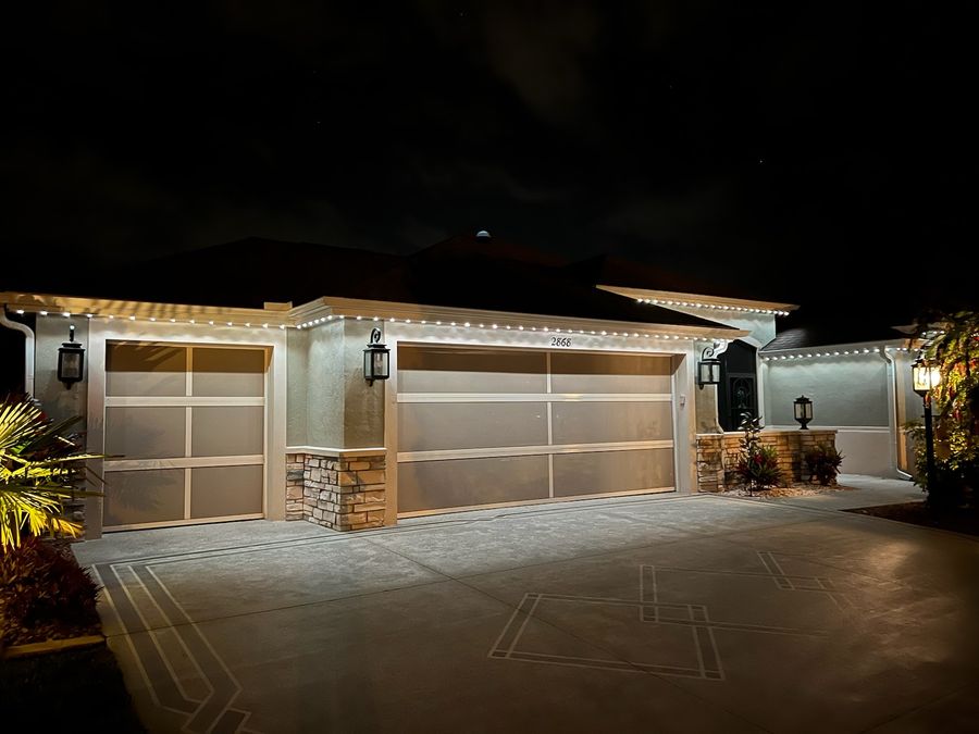 Architectural white lighting on Florida stucco home